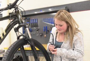 It's electric: Motor-powered bicycles might help UHS students cruise to careers in energy, design